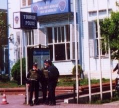 heavily armed police in front of a Tourist Police post