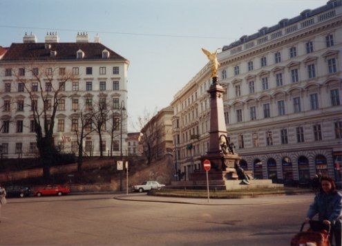 apartment buildings and statue