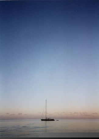 A boat, shortly before dusk