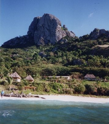 Crag and village, from a boat