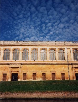 Wren library, with the sun on it, and white clouds